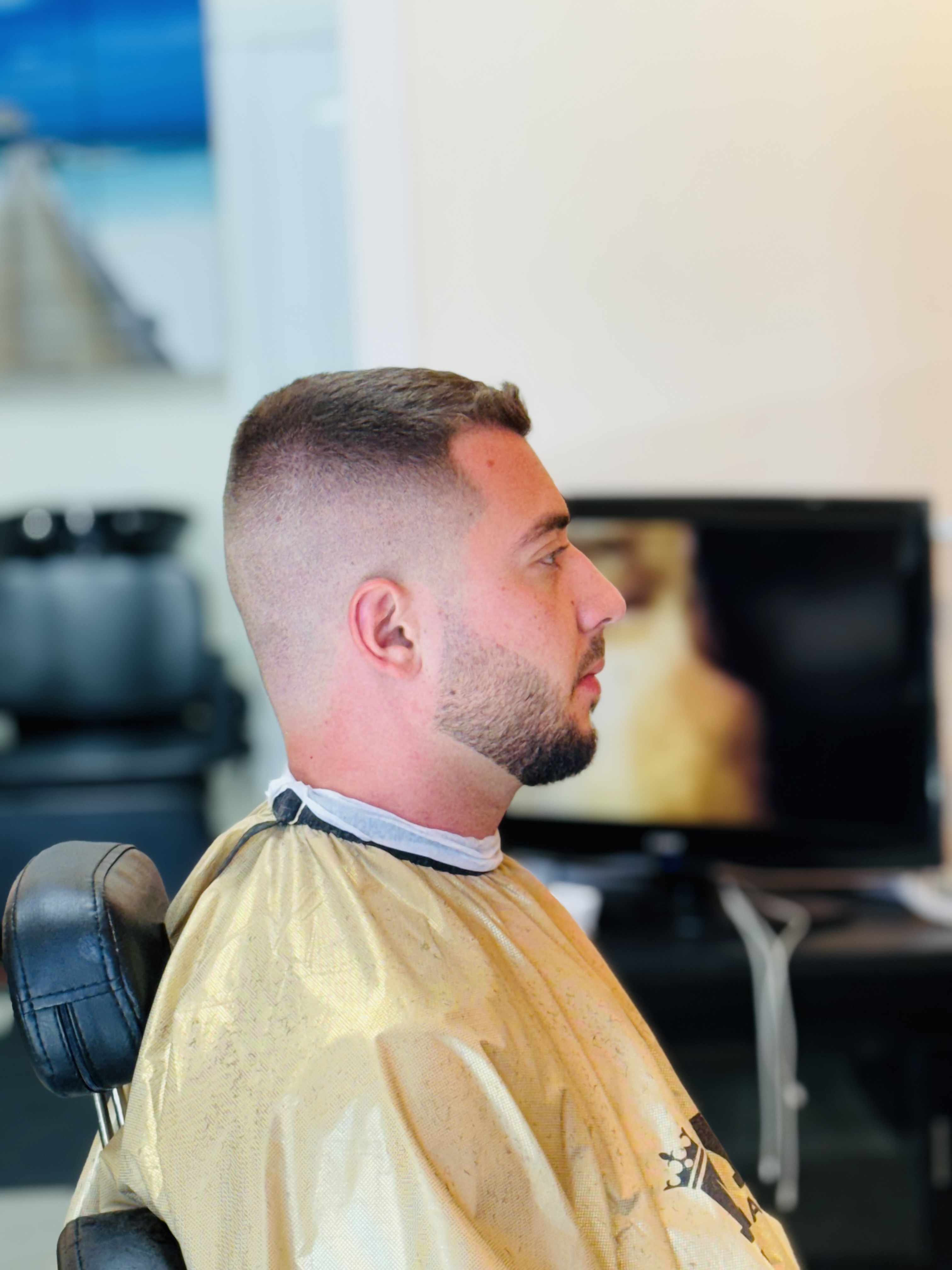 High skin fade with short beard