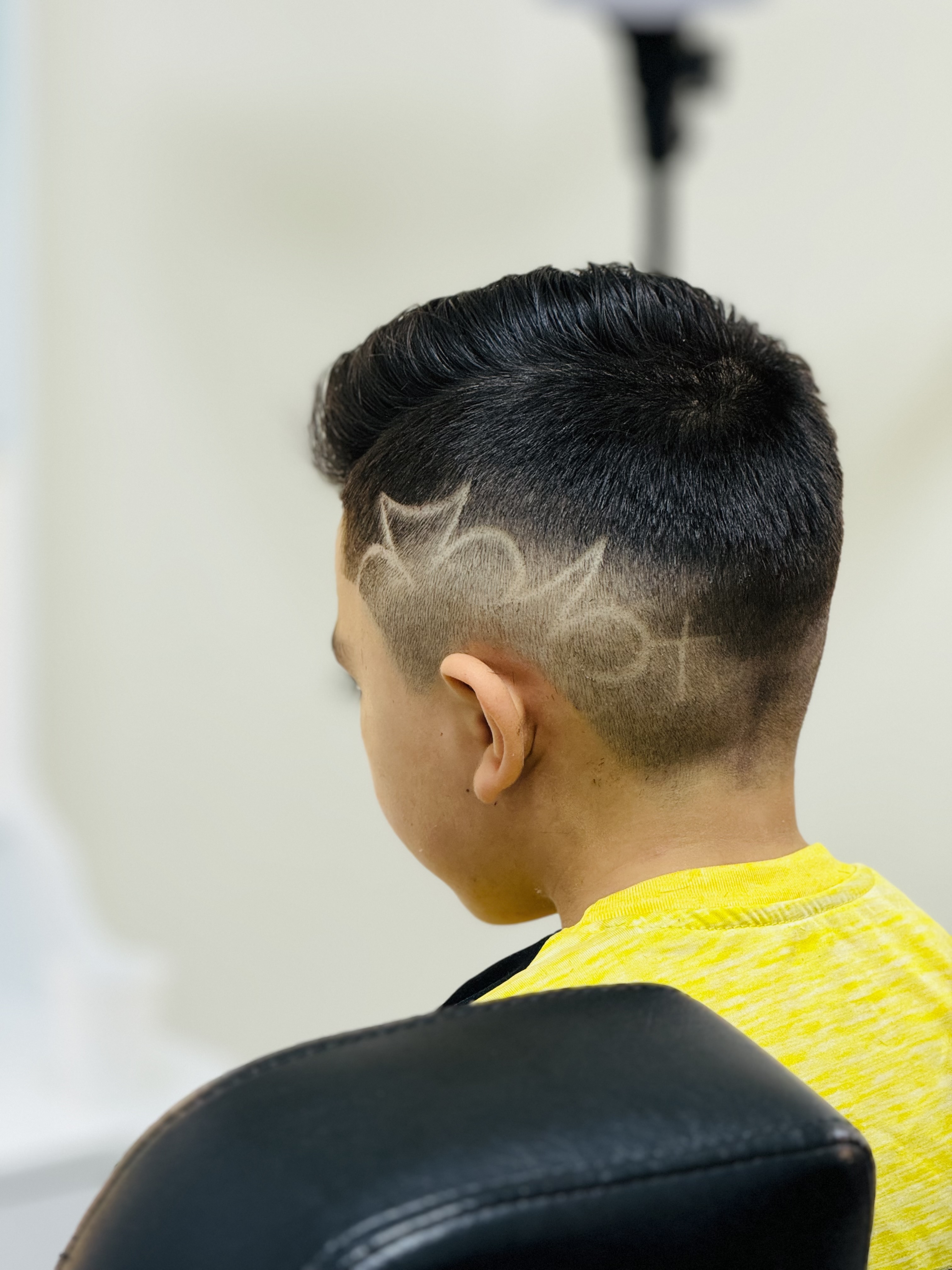 Custom razor art design shaved into fade