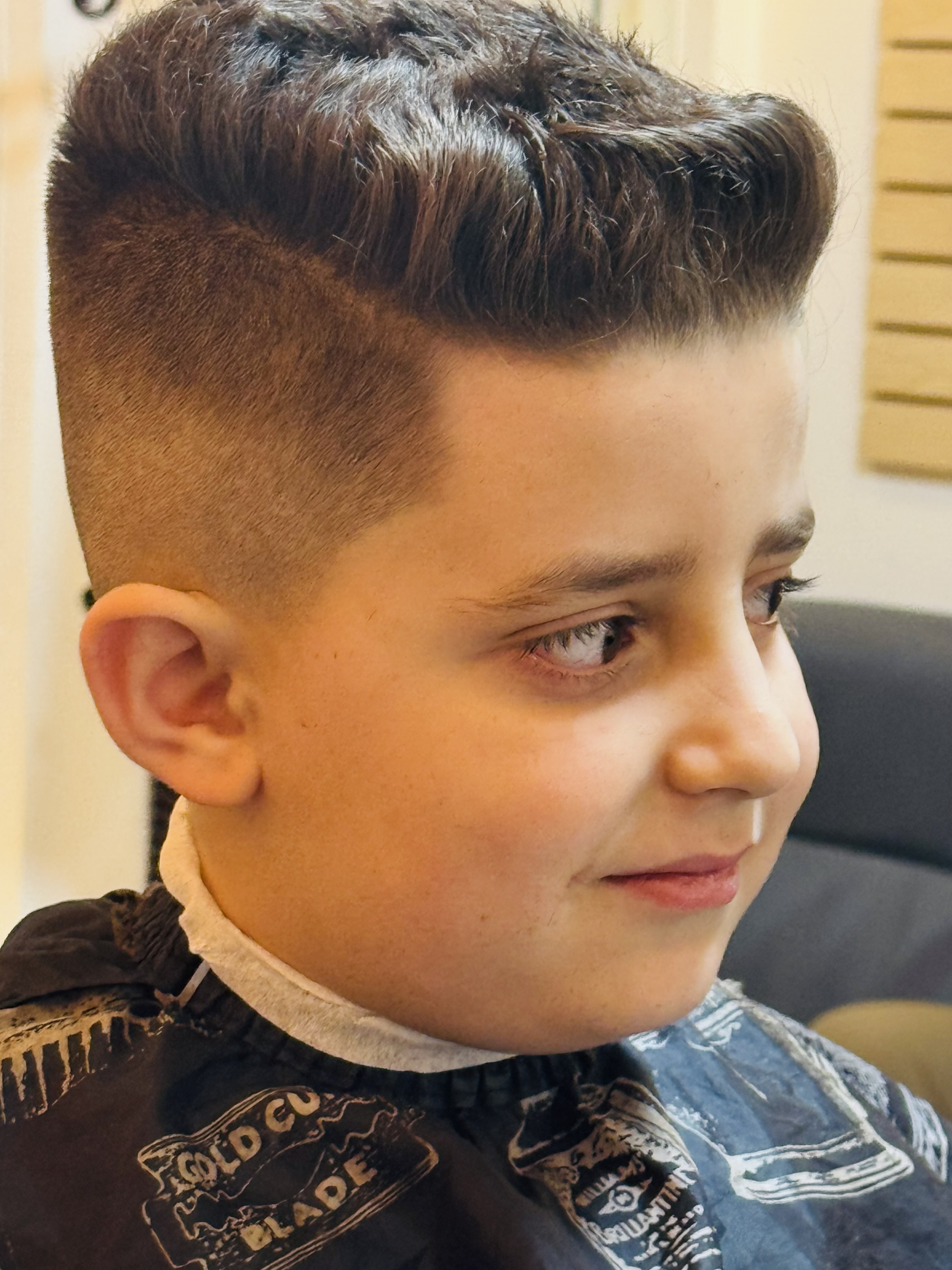 Kids pompadour fade, side view